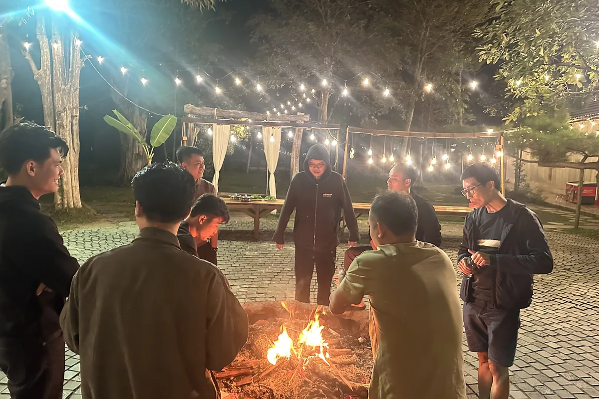 CommonWorks team: around the campfire